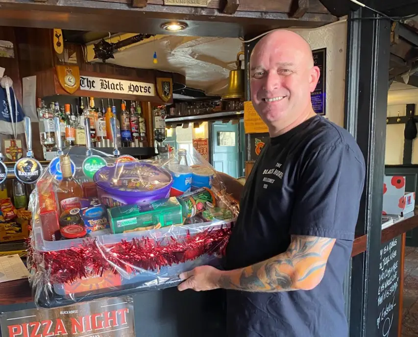 Terry Gillman with the Lions Christmas Hamper