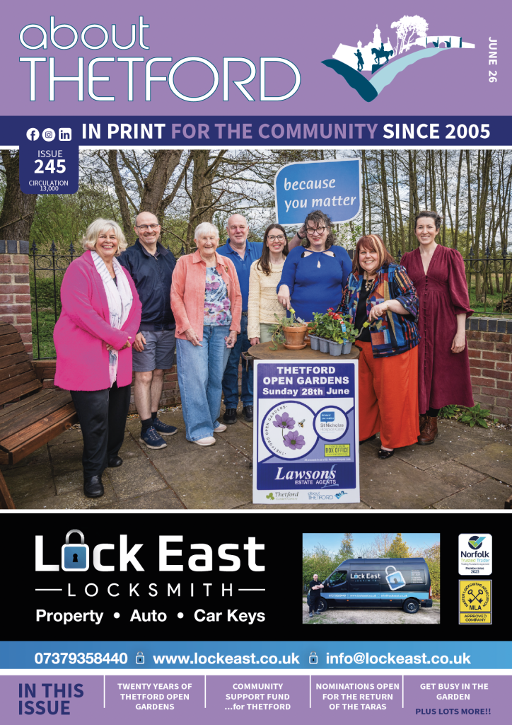 Front cover of the June 2026 issue of About Thetford magazine, Issue 245. The purple-themed cover features the About Thetford logo and the slogan “IN PRINT FOR THE COMMUNITY SINCE 2005”, along with social media icons and circulation information stating 13,000 copies. The main cover image shows a group of seven people gathered outdoors around a sign promoting “Thetford Open Gardens Sunday 28th June”, with trees and a “because you matter” sign in the background. Several people are holding gardening items and smiling at the camera. A large advert for Lock East Locksmith appears across the lower-middle section of the cover, featuring the company logo, a photograph of a locksmith van, and text advertising “Property • Auto • Car Keys” alongside contact details and accreditation logos. At the bottom of the cover, teaser headlines read: “Twenty years of Thetford Open Gardens”, “for Thetford… Community Support Fund”, “Nominations open for the return of the Taras”, and “Get busy in the garden plus lots more!!”.
